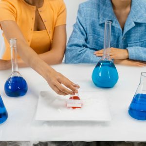 Person Holding an Erlenmeyer Flask